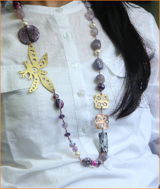 Shades of purple in semi-precious and glass beads with Copper and Brass motif