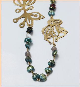 Shimmering blue beeds and Brass motif