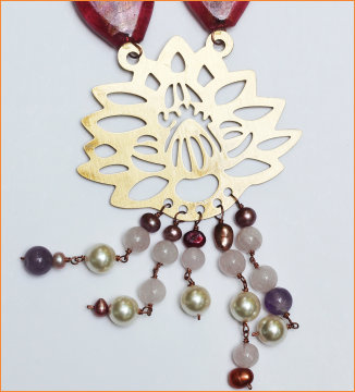 Motif in Brass with semi precious stones